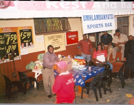 The author's social club (Umhlambanyatsi Social Club) & patrons of Umhlambanyatsi Sports Bar contribute & collect monthly donations for Cheshire Holmes Swaziland, Matsapha, 2007.
